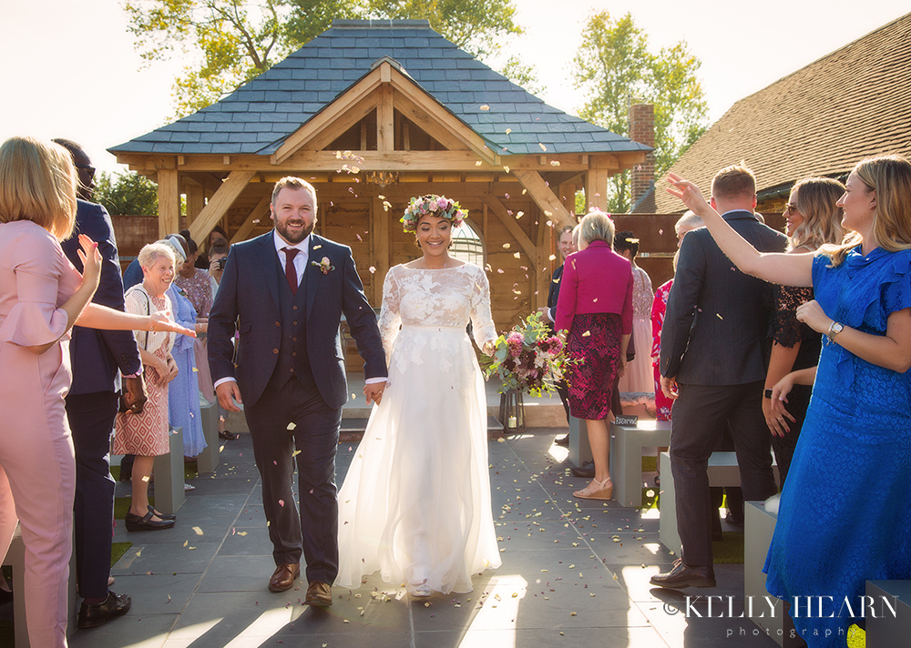 BOG_bride-and-groom-confetti-aisle.jpg#asset:2291