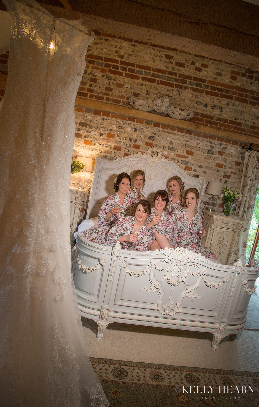 CART_bridesmaids-on-bed-in-robes.jpg#asset:1928