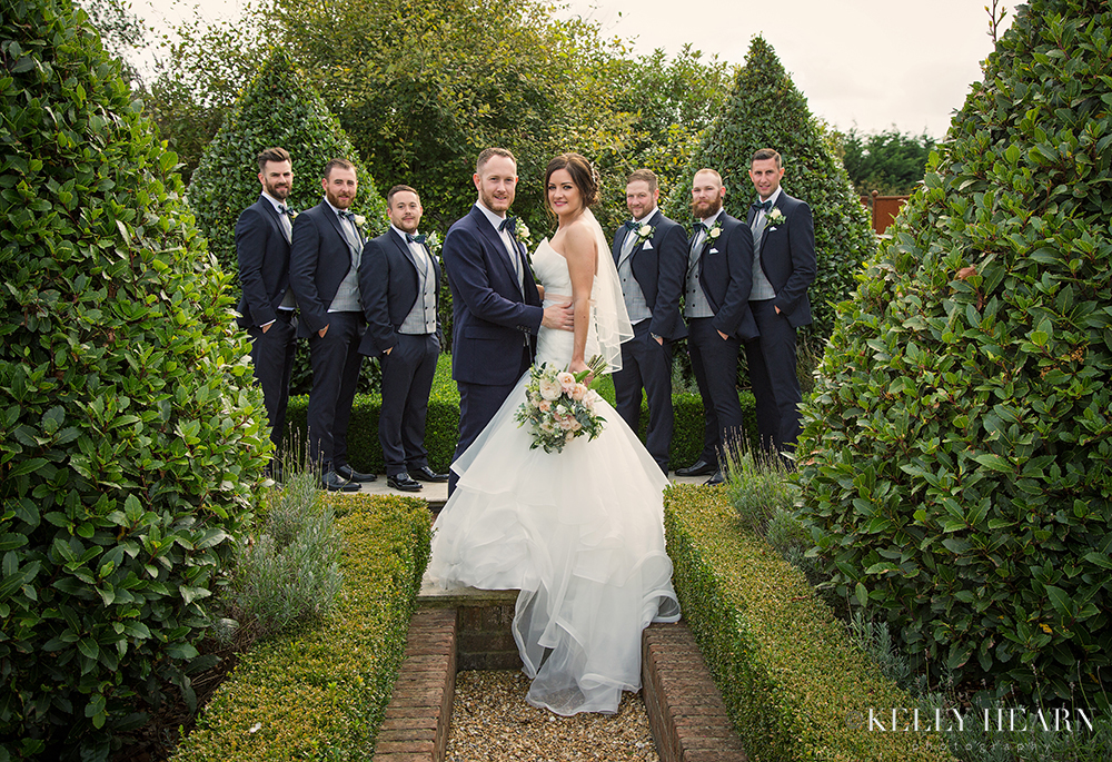 HAR_groomsmen-bride-garden.jpg#asset:1814