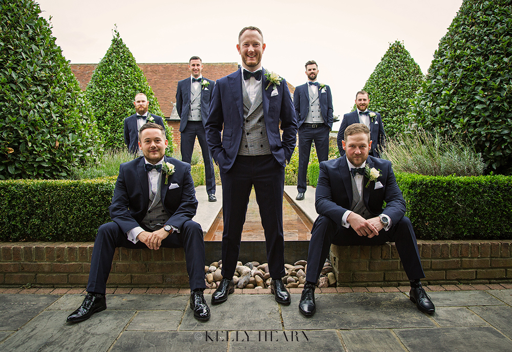 HAR_groomsmen-triangles-garden.jpg#asset:1813