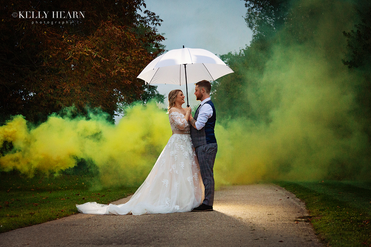 MAT_bride-and-groom-with-umbrella-and-smoke-bomb.jpg#asset:2751