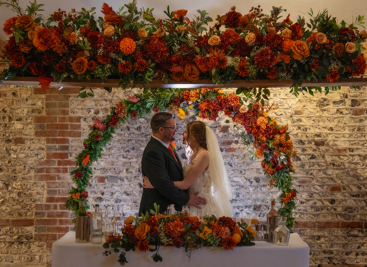 MCCA_couple-floral-archway.jpg#asset:4492