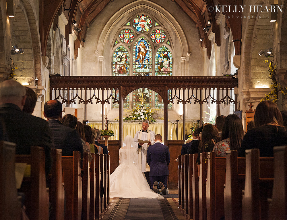 NAX_back-of-church-kneeling.jpg#asset:2030