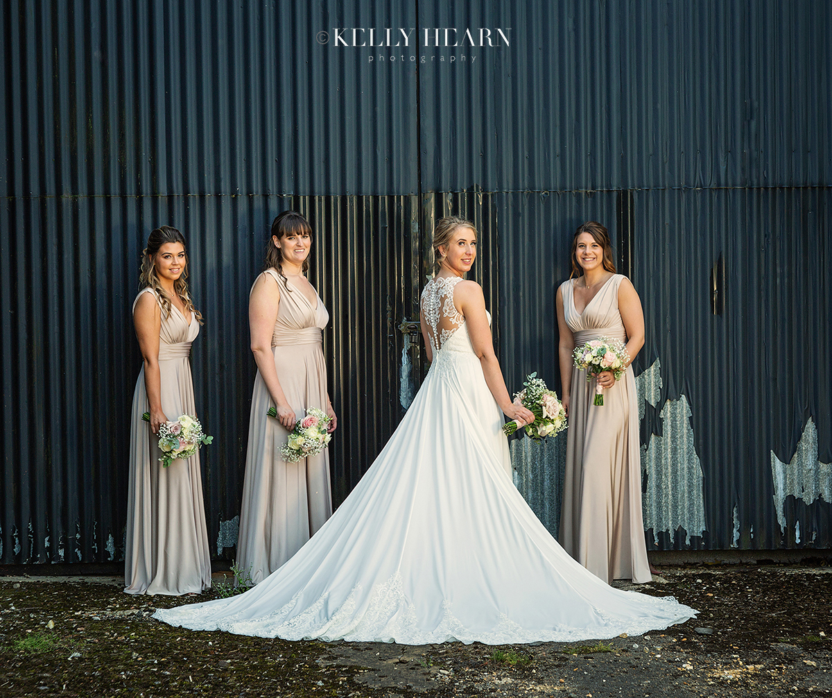 PAG_bride-bridesmaids-industrial-backdrop.jpg#asset:2621