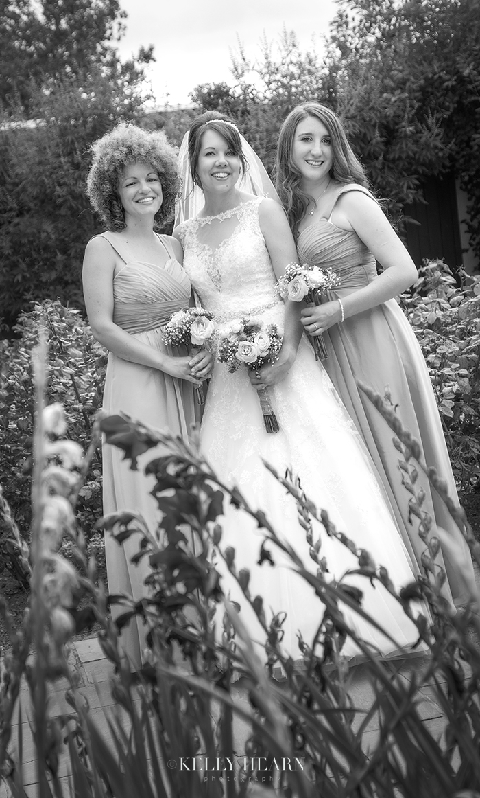 PEA_bridesmaids-and-bride-garden.jpg#ass