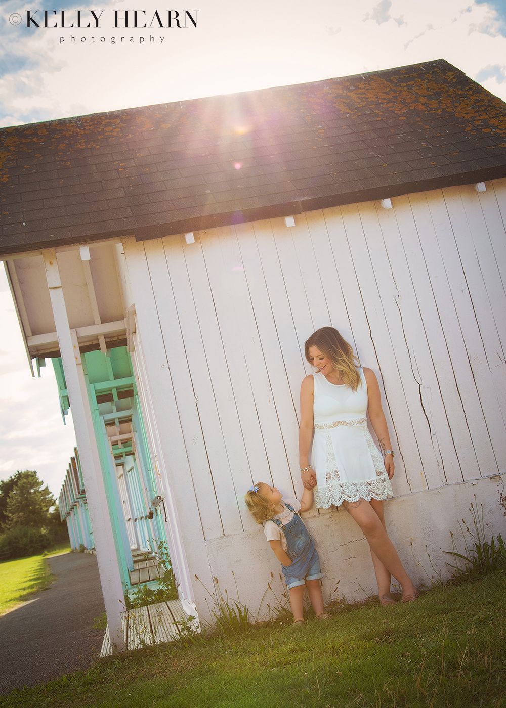 PORT_mum-daughter-beach-huts.jpg#asset:1978