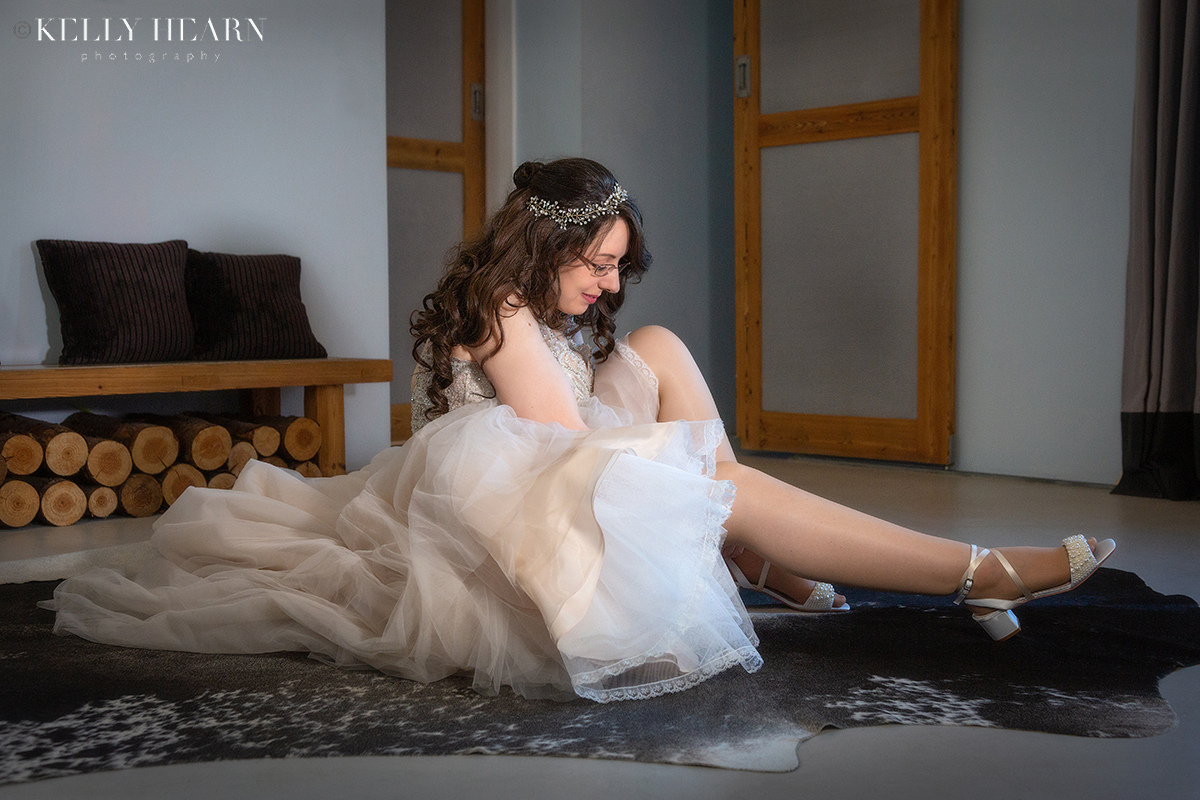 POW_bride-putting-shoes-on-getting-ready.jpg#asset:3517