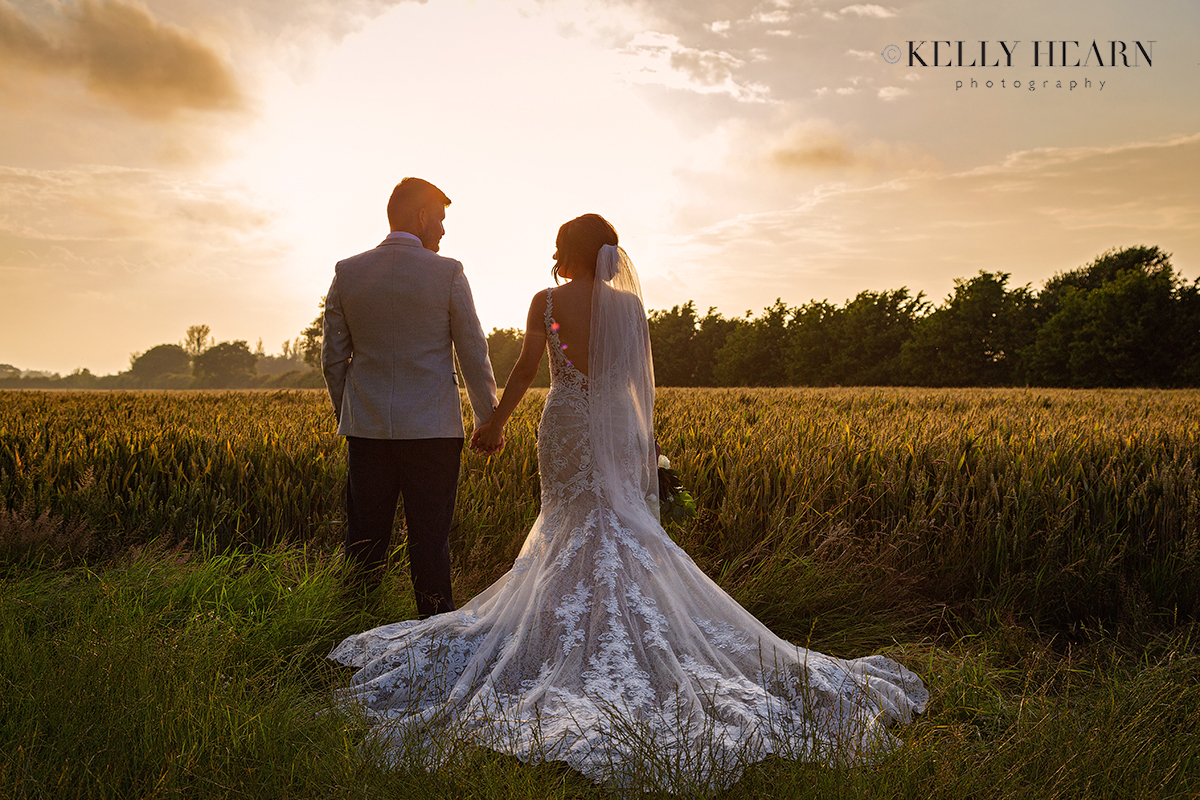 REE_bride-groom-sunset-field.jpg#asset:3050