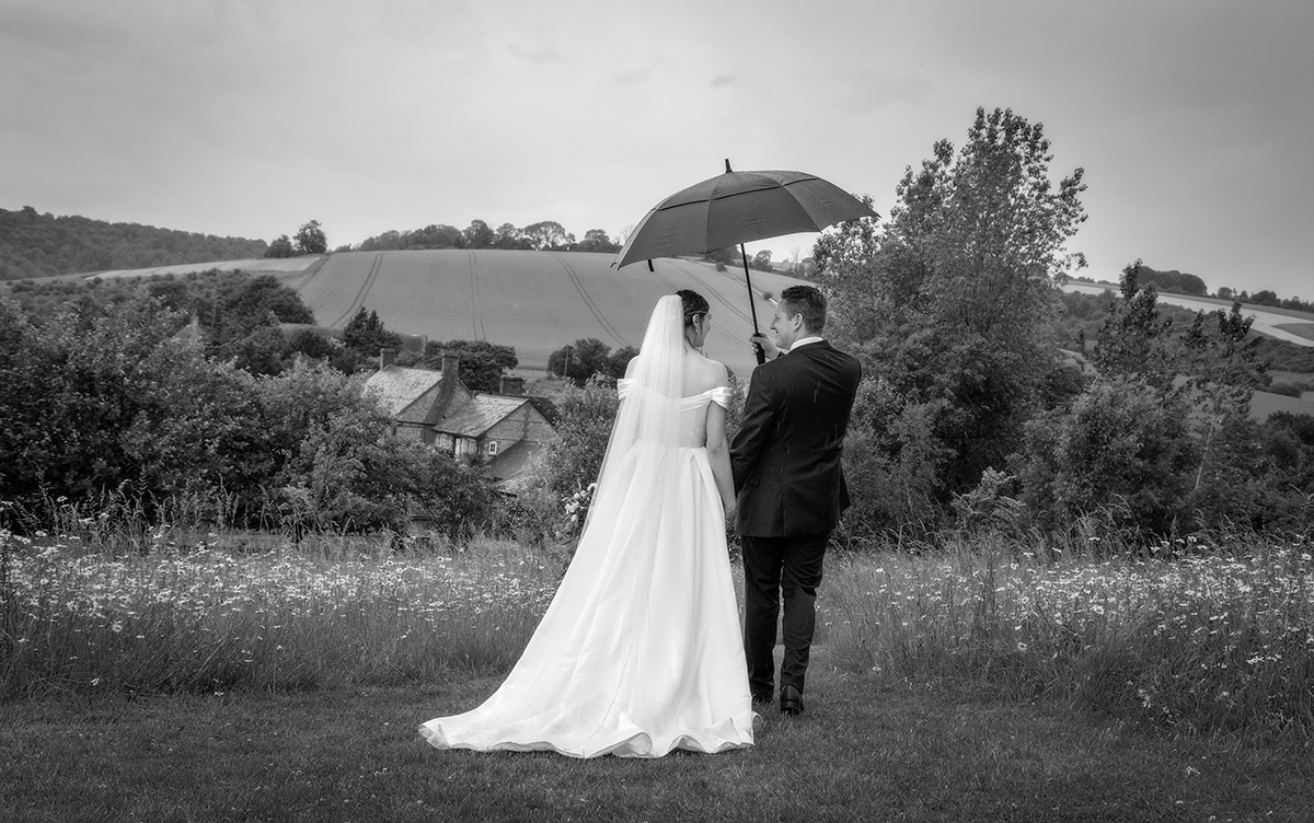 Ross_Hill-couple-umbrella.jpg#asset:4337