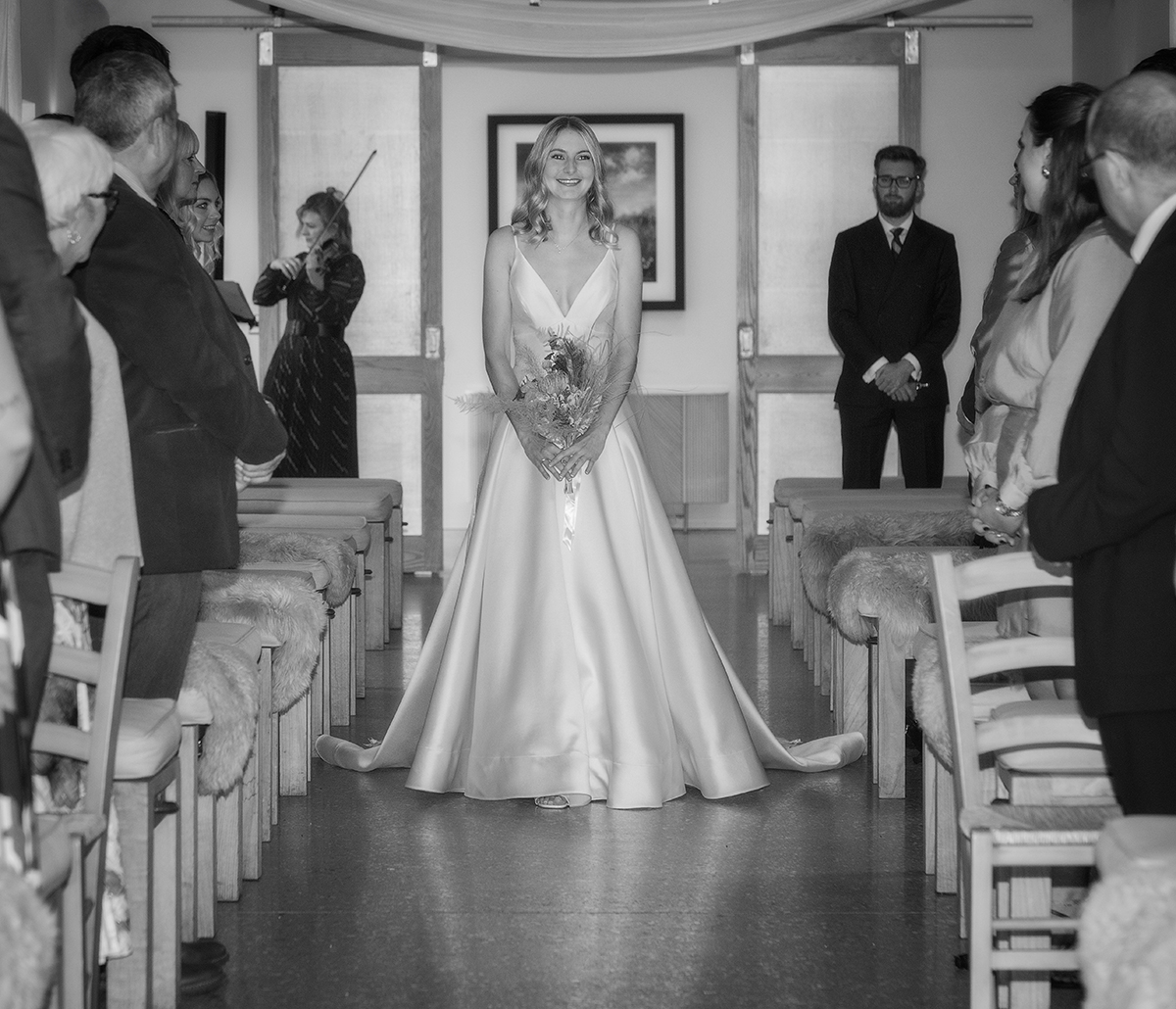 SAR_bride-aisle-happiness.jpg#asset:4407