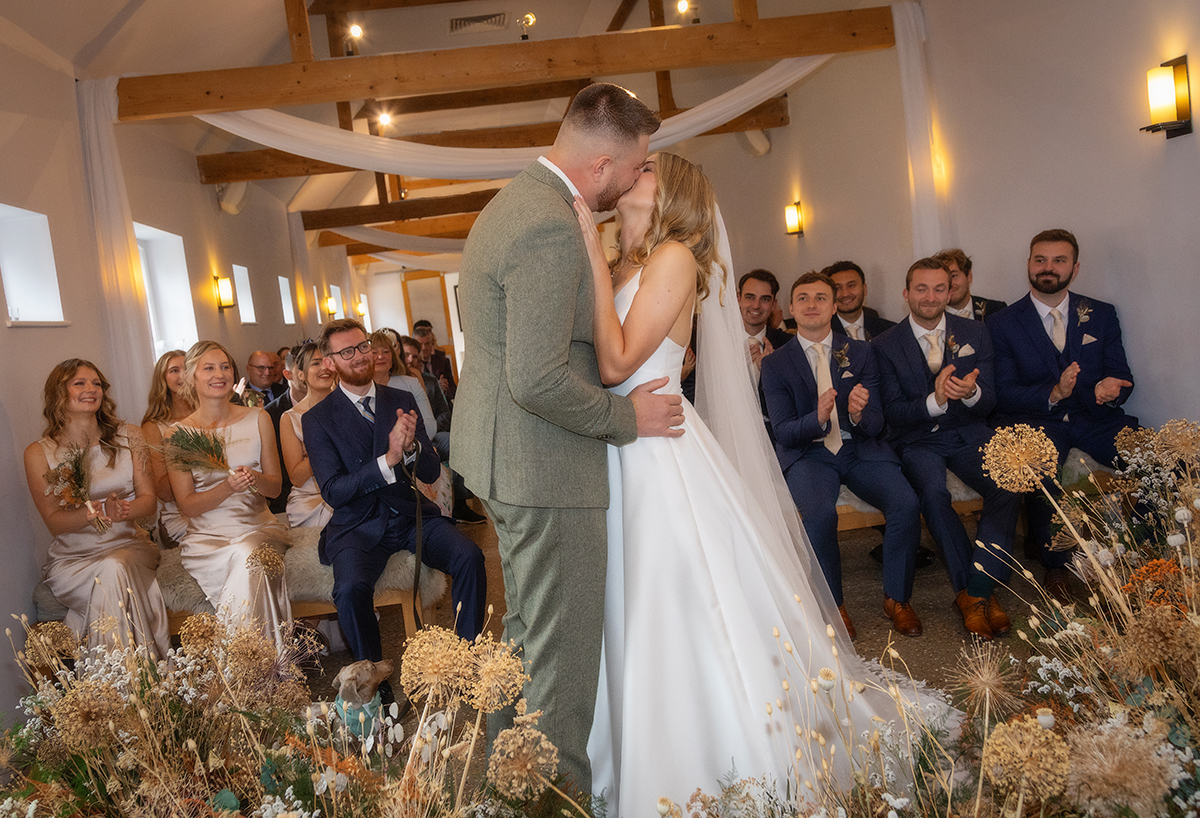 SAR_couple-ceremony-kiss.jpg#asset:4413