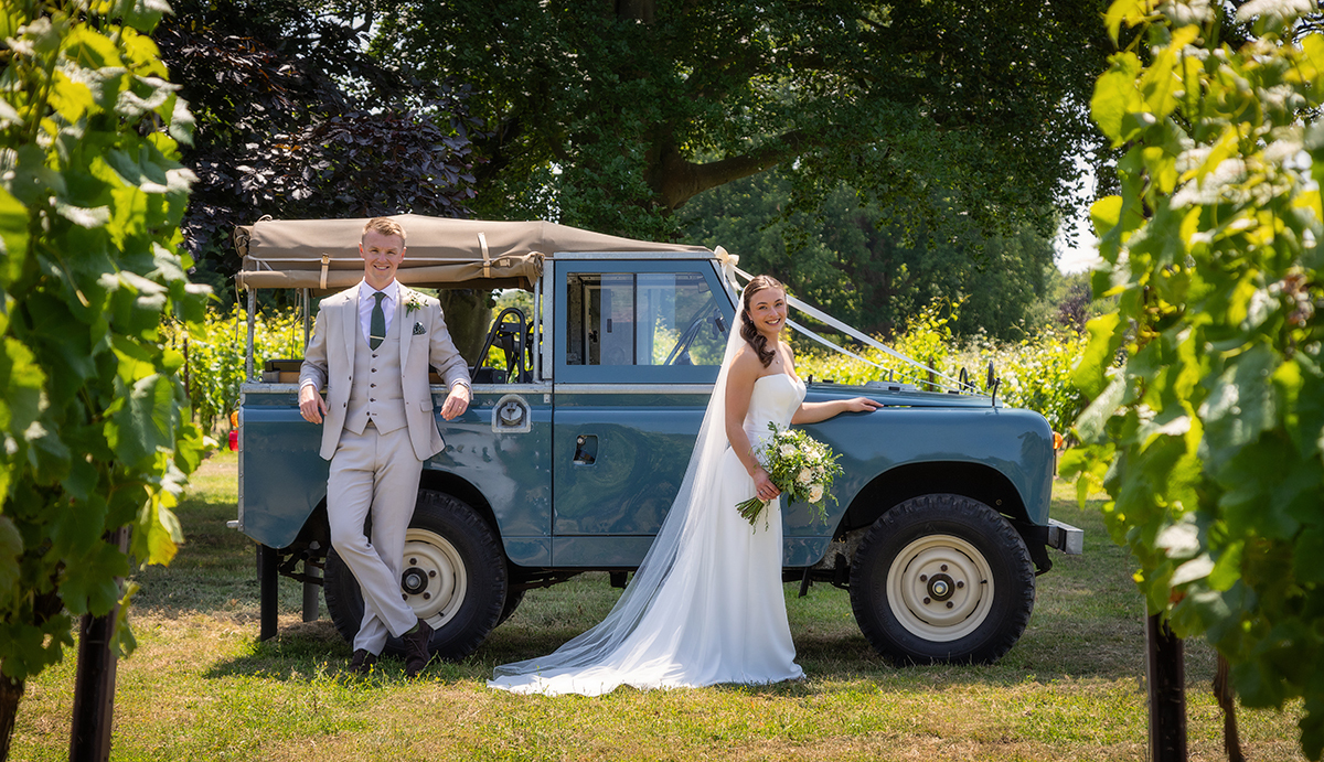 SHA_Vineyard-couple-landrover.jpg#asset:4234