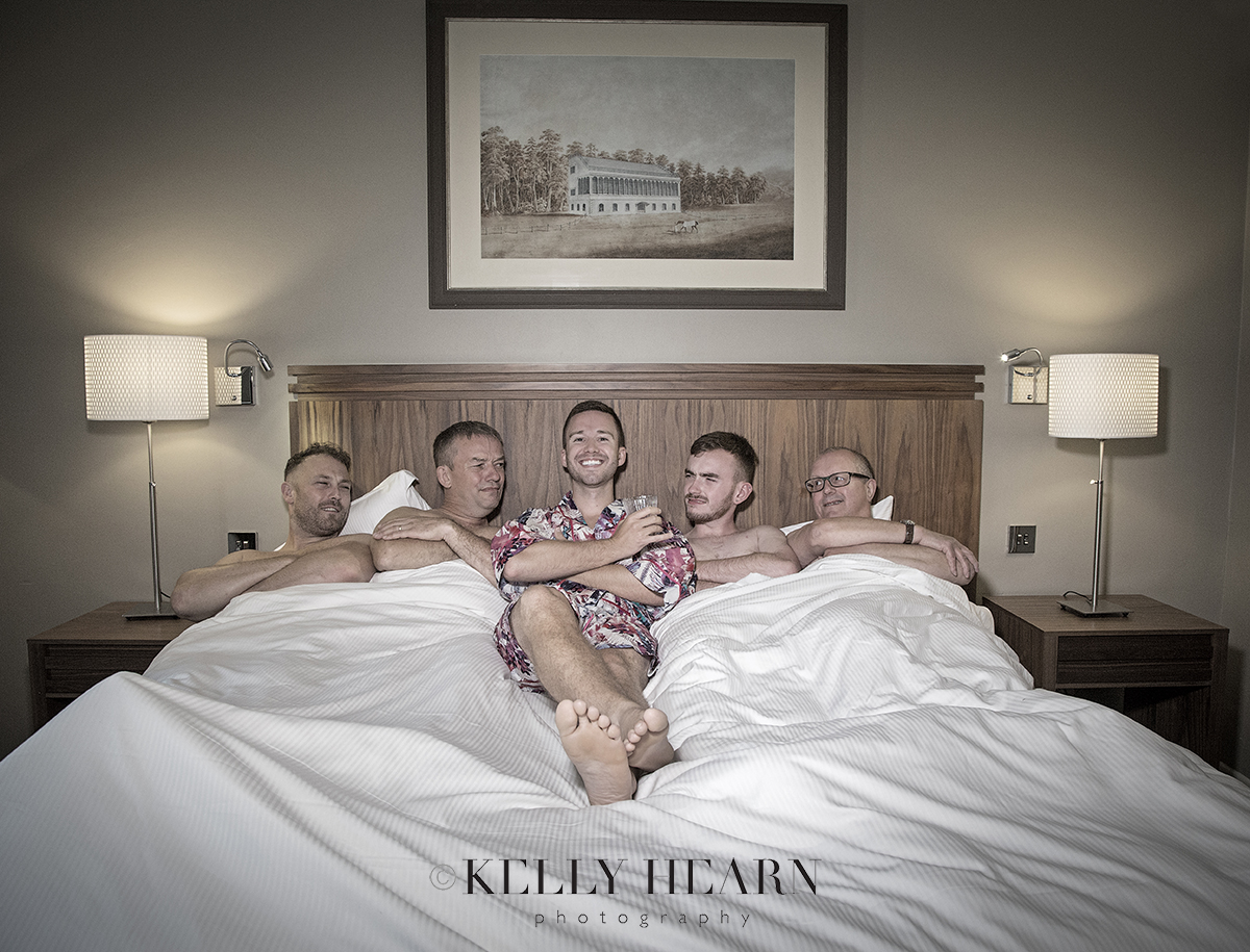 THO_groomsmen-in-bed.jpg#asset:2111