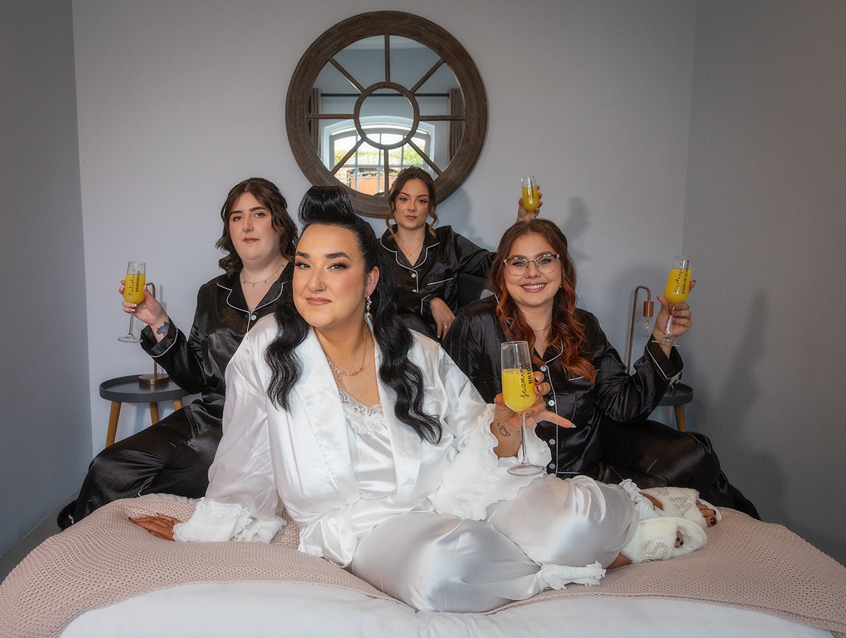 WHIT_bride-bridesmaid-bed.jpg#asset:4462