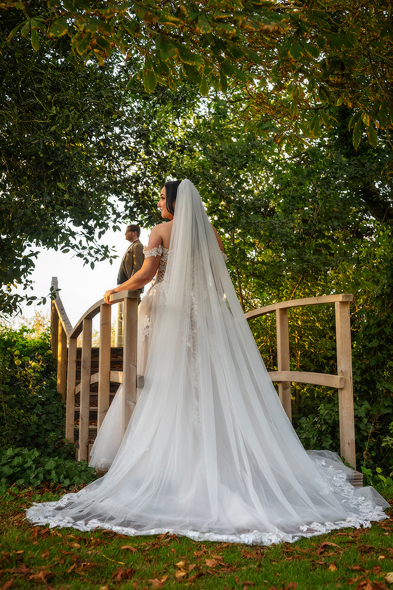 WHIT_couple-outdoors-bridge.jpg#asset:4481