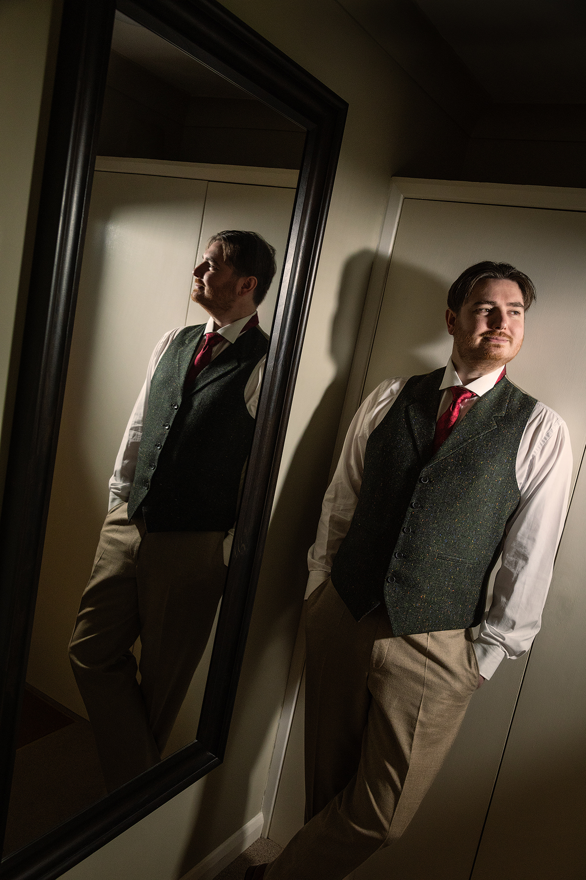 WHIT_groom-mirror-reflection.jpg#asset:4475