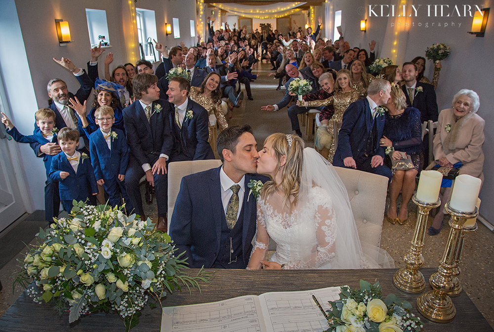 COL_register-signing-kiss.jpg#asset:2440