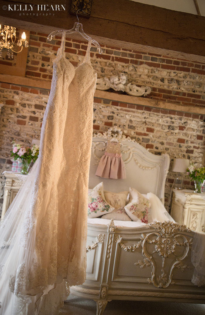DRA_wedding-dress-hanging-by-bed.jpg#ass