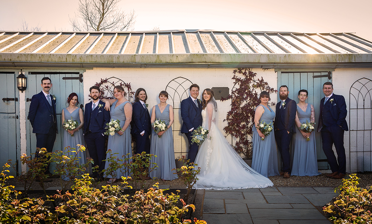 HOU_couple-bridalparty-posed.jpg#asset:4534
