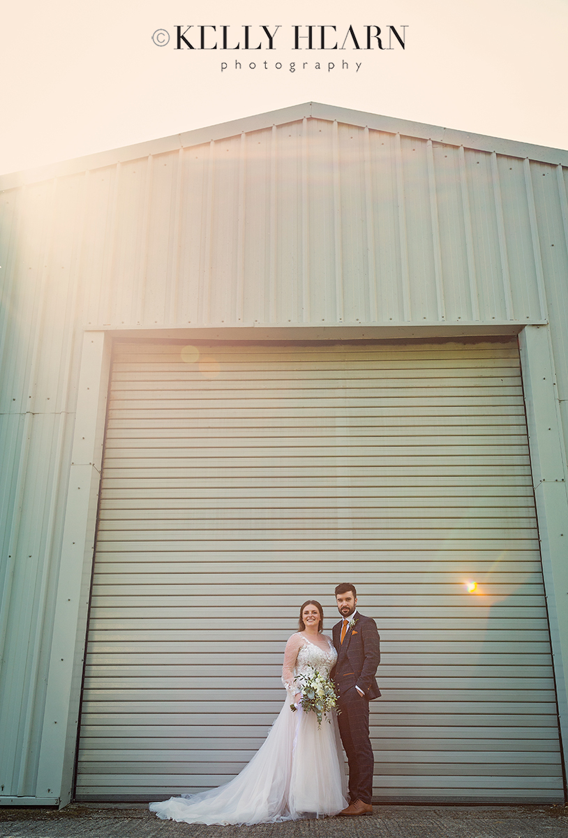 JER_bride-groom-barn-door.jpg#asset:3236