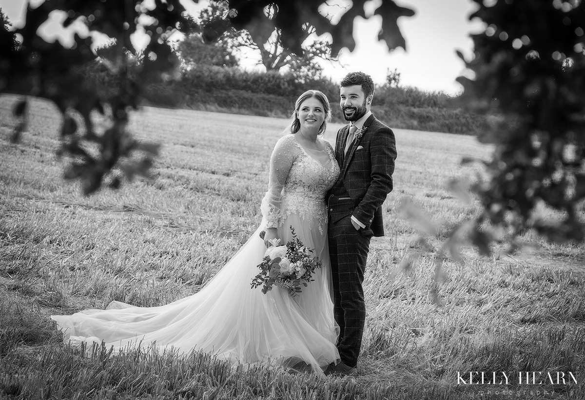 JER_bride-groom-black-white-field.jpg#asset:3234