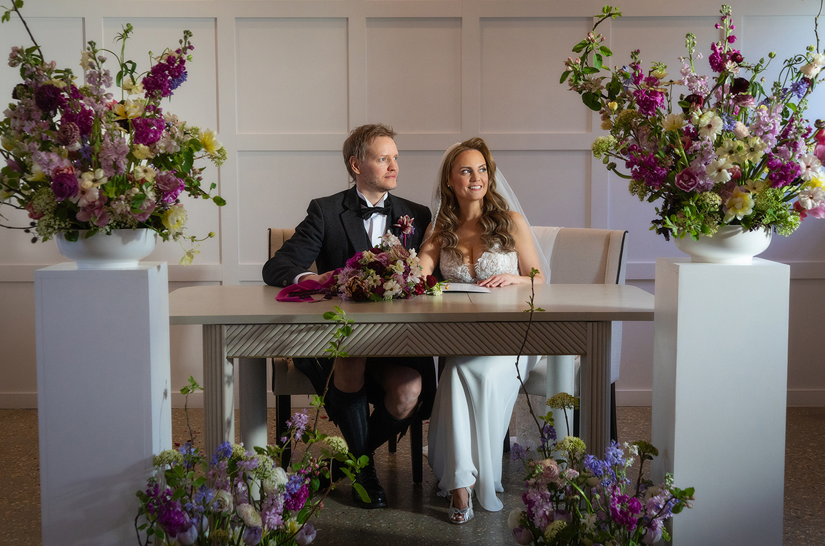 MCL_couple-signing-florals.jpg#asset:4605