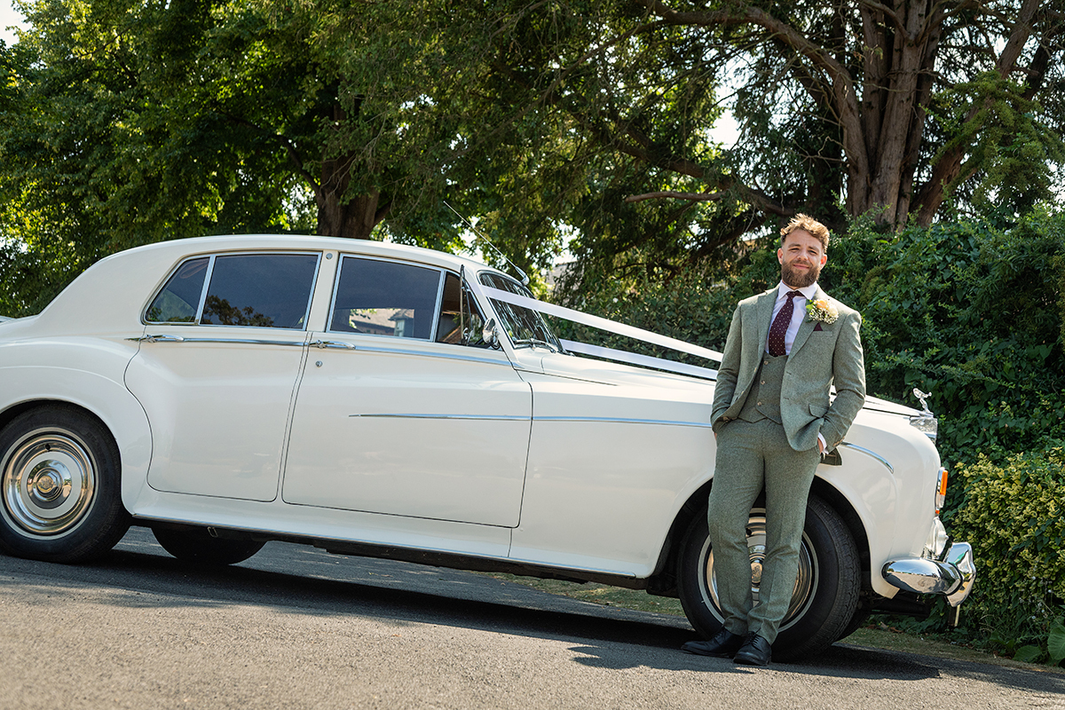 PUT_groom-posed-car.jpg#asset:4758