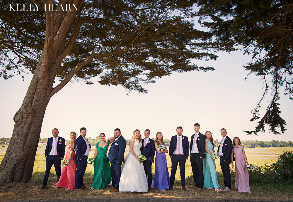 WEST_couple-bridal-party-under-trees.jpg#asset:2140