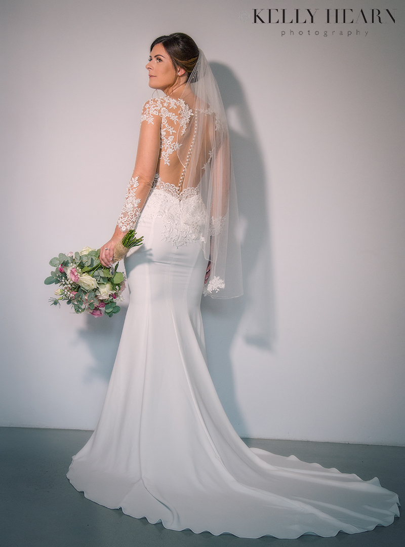 WHITE_bride-portrait-back-of-dress.jpg#asset:2235